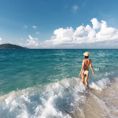 Wall Mural - Girl on a beach