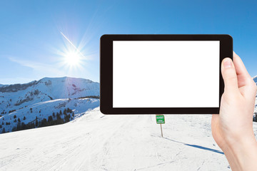 Sticker - photo of skiing tracks on snow slopes in sunny day