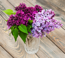 Wall Mural - Vase with lilac flowers