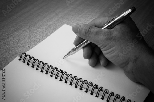 Fototapeta na wymiar writing a note with a fountain pen