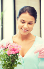 Wall Mural - lovely housewife with flower