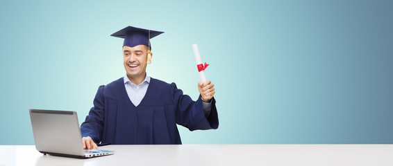 Wall Mural - smiling adult student in mortarboard with diploma