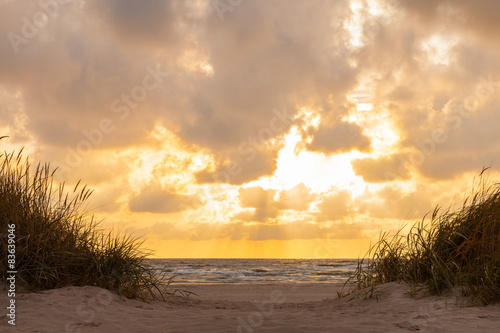 Obraz w ramie Dramatic sunset with heavy clouds over Baltic.