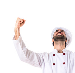 Wall Mural - Lucky chef over isolated white background