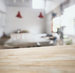 Wall Mural - Wooden table top counter bar with blurred kitchen background