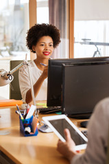 Poster - happy creative female office worker with computer