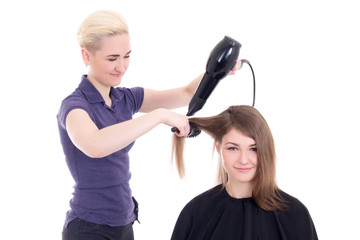 happy woman hair stylist doing haircut to client isolated on whi