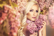 © Aarrttuurr - Beauty fashion model girl with lilac flowers