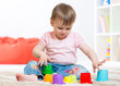 © Oksana Kuzmina - little girl playing with toys