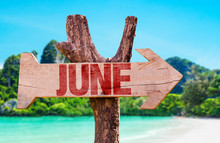 June Wooden Sign With Beach Background