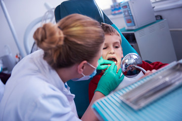 Wall Mural - Young boy in a dental surgery