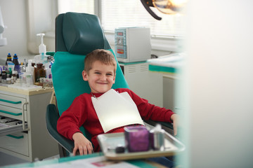 Wall Mural - Young boy in a dental surgery