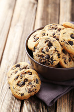 Chocolate Chip Cookies In Bowl On Brown Wooden Background