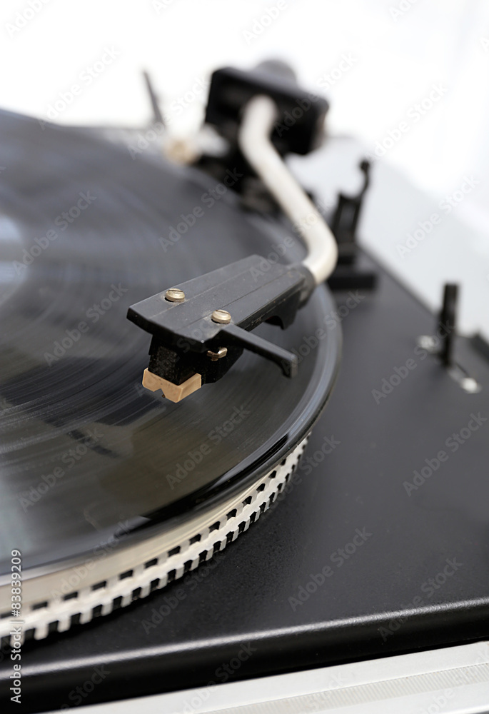 Gramophone with a vinyl record, closeup