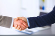 © lenetsnikolai - Business people shaking hands, finishing up a meeting