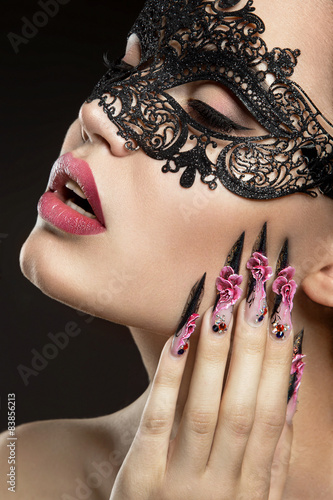 Beautiful girl with long nails and sensual lips. Beauty face. Fototapete