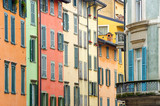 Fototapeta  - Italian houses with colorful walls and windows in Bergamo