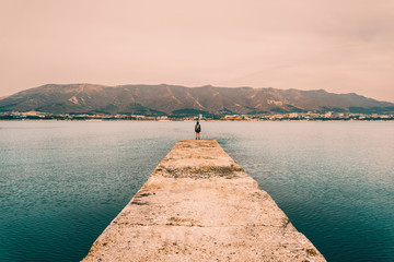 Sticker - Hiker woman standing on pier in summer