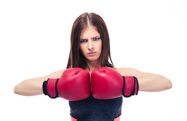 Wall Mural - Serious sporty woman with boxing gloves