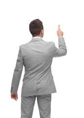 Wall Mural - businessman pointing finger or touching something