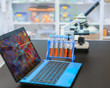 Microscope and laptop with digital microscopic image