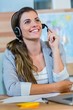 © WavebreakMediaMicro - Pretty travel agent speaking to customer