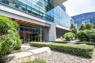 Wall Mural - modern building and green footpath