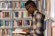 © Jale Ibrak - Male College Student In A Library