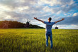 © sergey ponomarenko - Man on nature background with arms outstretched. Free man