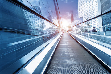 Canvas Print - fast escalator and sunbeam