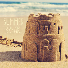 Sandcastle On A Beach And The Text Summer Break