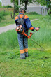 © Kryuchka Yaroslav - Man mows grass