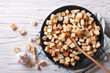 Homemade croutons in a bowl horizontal view top
