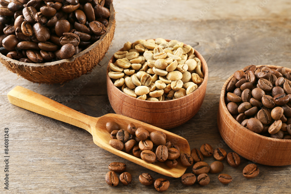 Various of coffee in small dishes on wooden background