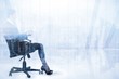 © WavebreakmediaMicro - Composite image of businesswoman sitting on swivel chair