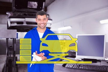 Poster - Composite image of smiling mechanic wiping hands with cloth
