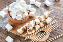 Marshmallow Skewers On The Wooden Board