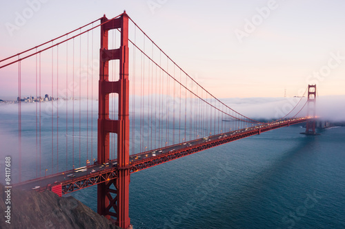 Plakat na zamówienie Golden Gate Bridge partly in fog. San Francisco. California 