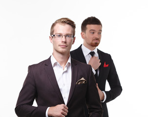 close-up portrait of two young businessmen