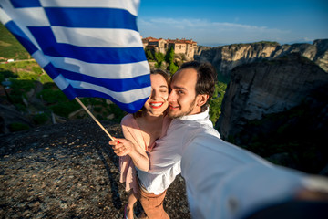 Poster - Young couple travelers in Greece