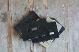 Fototapeta Zwierzęta - cassette tape recorder on wood background