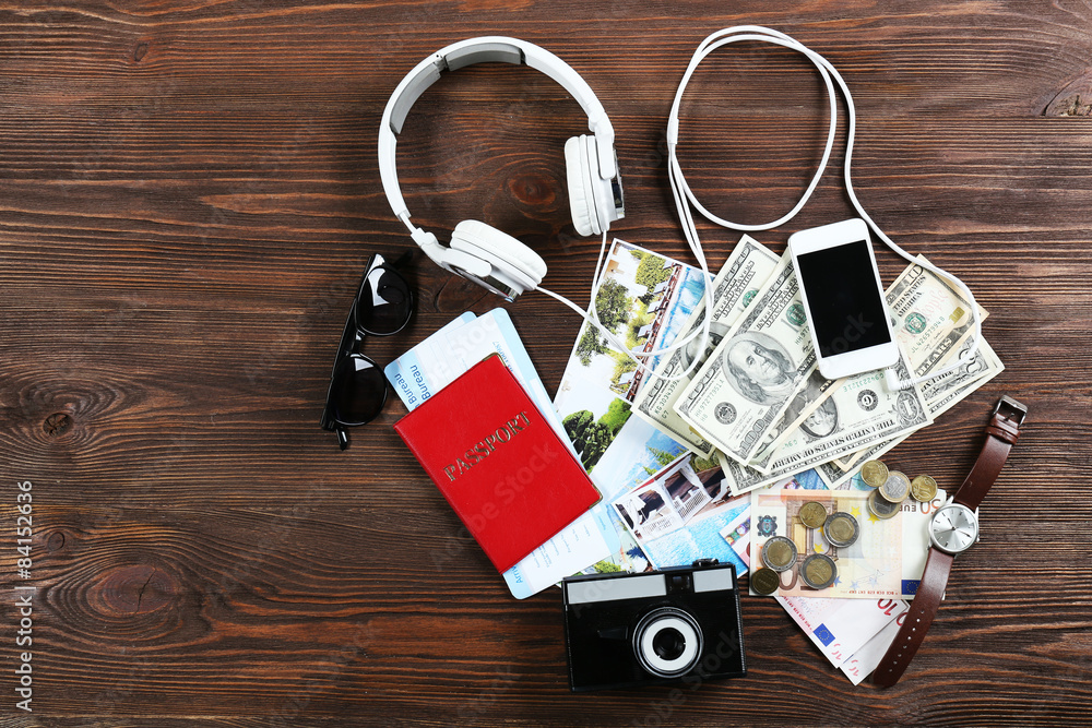 Set of trip stuff on wooden background