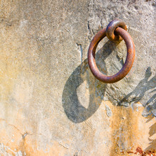 Old Iron Ring Fixed In A Plaster Wall - Toned Image