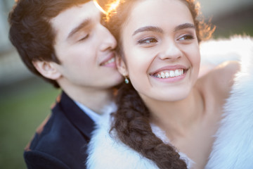 Wall Mural - Close portrait of happy wedding couple