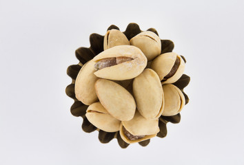 Handful of pine nuts in figured form