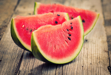 Watermelon slices on the wooden table