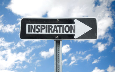 Inspiration direction sign with sky background