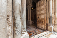 Pillars And Wooden Door Of The Church Of The Holy Sepulchre.