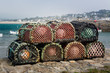 Lobster pots or traps on harbour wall in England