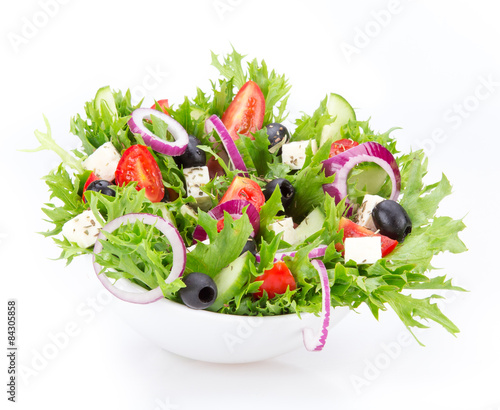 Naklejka dekoracyjna Fresh tasty salad over white